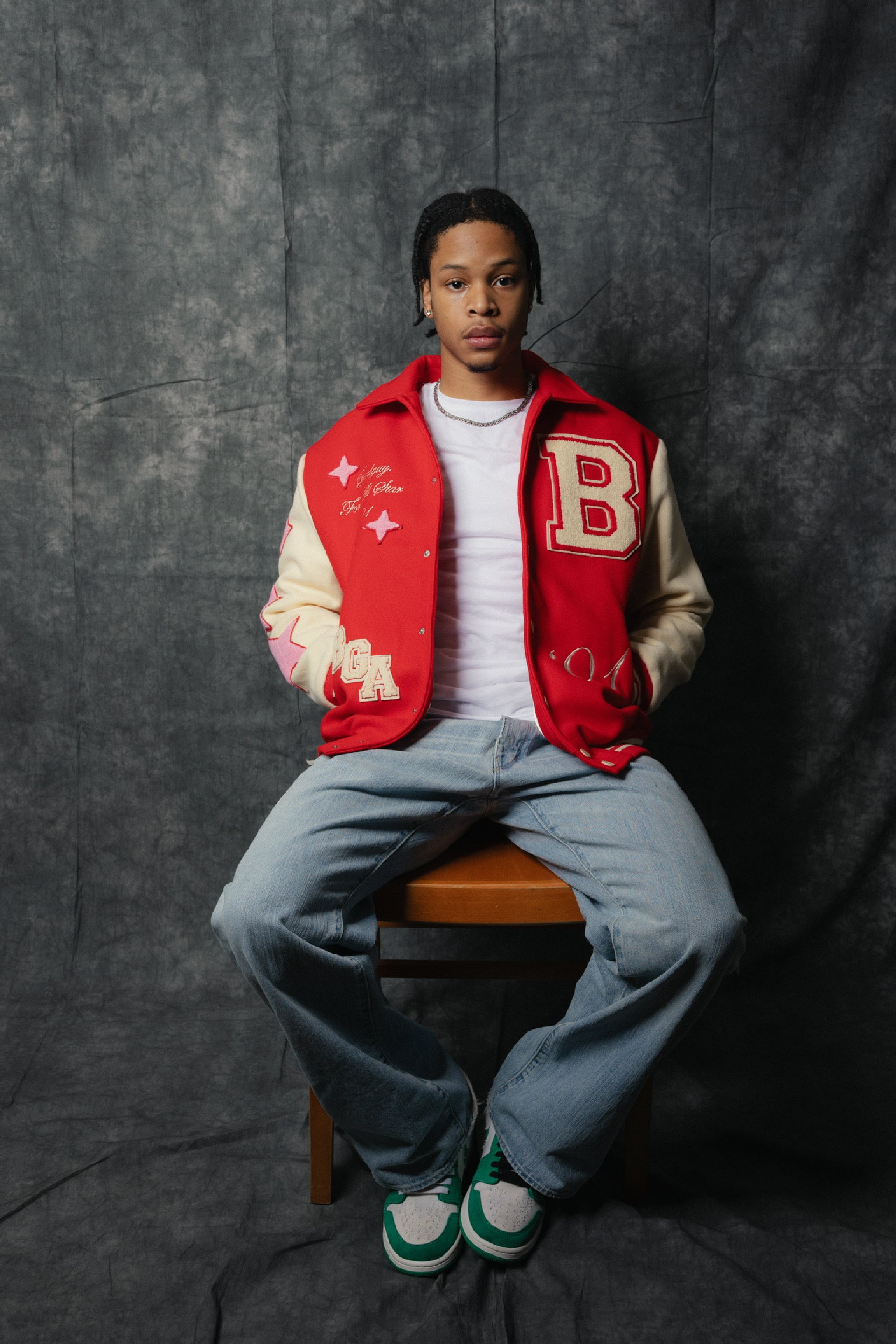 BADGUY ACADEMY VARSITY JACKET - A premium varsity jacket designed for students of the hustle, featuring bold BADGUY branding and crafted from high-quality materials. This stylish statement piece showcases street style and is available in limited quantities.