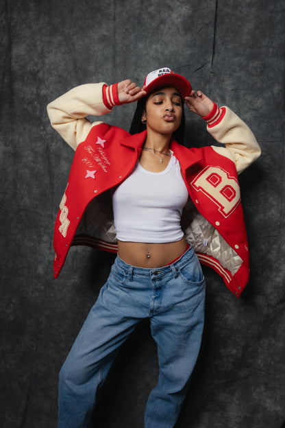 BADGUY ACADEMY VARSITY JACKET Women Fashion - A premium varsity jacket designed for students of the hustle, featuring bold BADGUY branding and crafted from high-quality materials. This stylish statement piece showcases street style and is available in limited quantities.